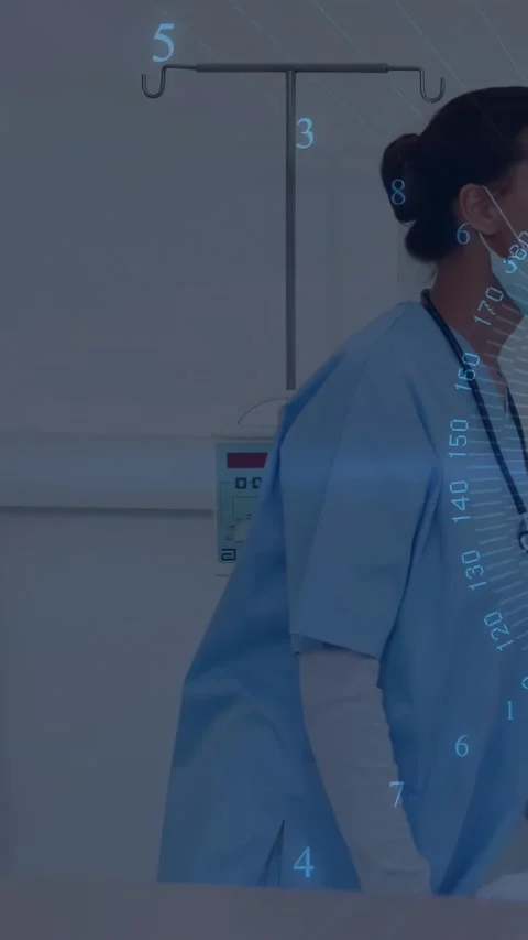 Vertical video: Nurse starting rounds, walking past IV pole while HUD overlay Video stock 332984742