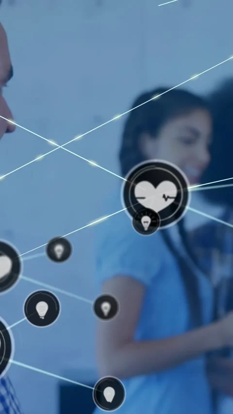 Vertical video: Nurse tapping phone in clinic starting heart and pin node web Stock Footage 331128508
