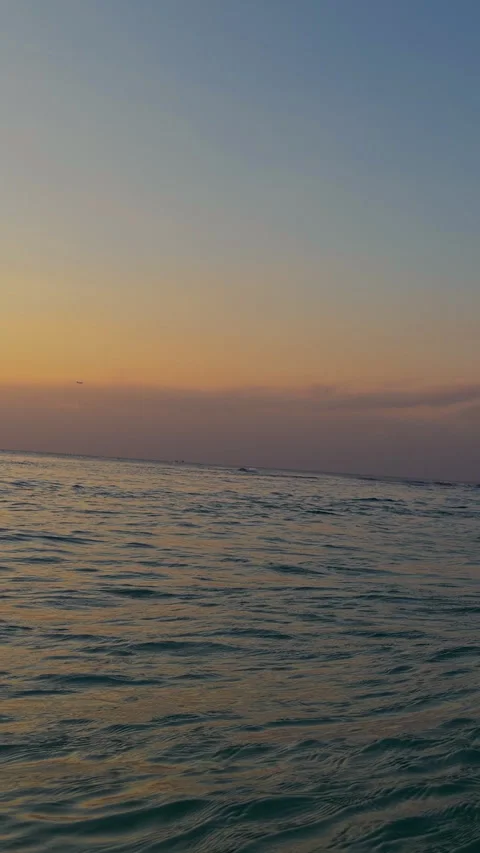 Vertical video. Ocean Spray and Water Droplets Exploding Around the Camera Durin Stock Footage 337061008