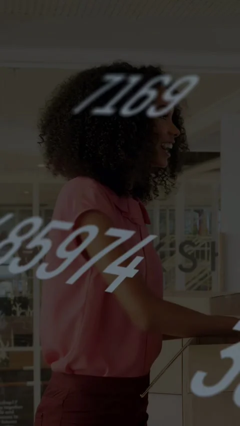 Vertical video: Office clerk opening parcel on drop taking papers, filing while Vidéo 333487225