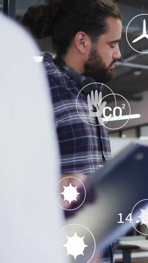 Vertical video: Office coworker lowering tablet man shifting as CO2 and sun Stock Footage 334382041