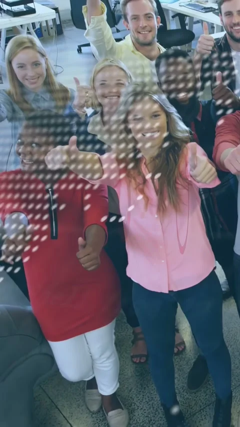 Vertical video: Office team cheering as camera rising and dot code overlay Stock Footage 334604681