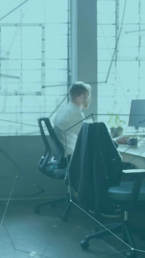 Vertical video: Office worker leaning and reaching for keys and mug while Stock Footage 333596058