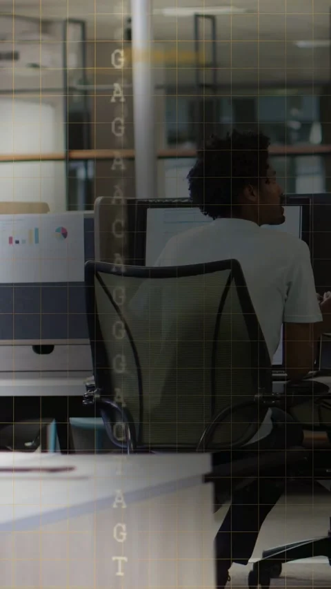 Vertical video: Office worker seeing monitor prompt leaning forward, turning Stock Footage 333528106