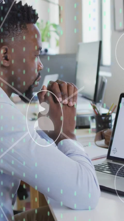 Vertical video: Office worker studying laptop, user icons and linking lines Stock Footage 333912922