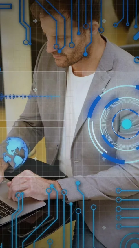 Vertical video: Office worker typing on laptop and handling globe, blue HUD Stock Footage 333464848