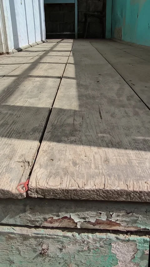 Vertical video of an old porch in Comarna, Iasi,dramatic window shadows. Stock Footage 334136281