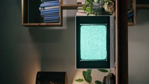 Vertical video of old television with grey interference screen on home Stock Footage 198252016