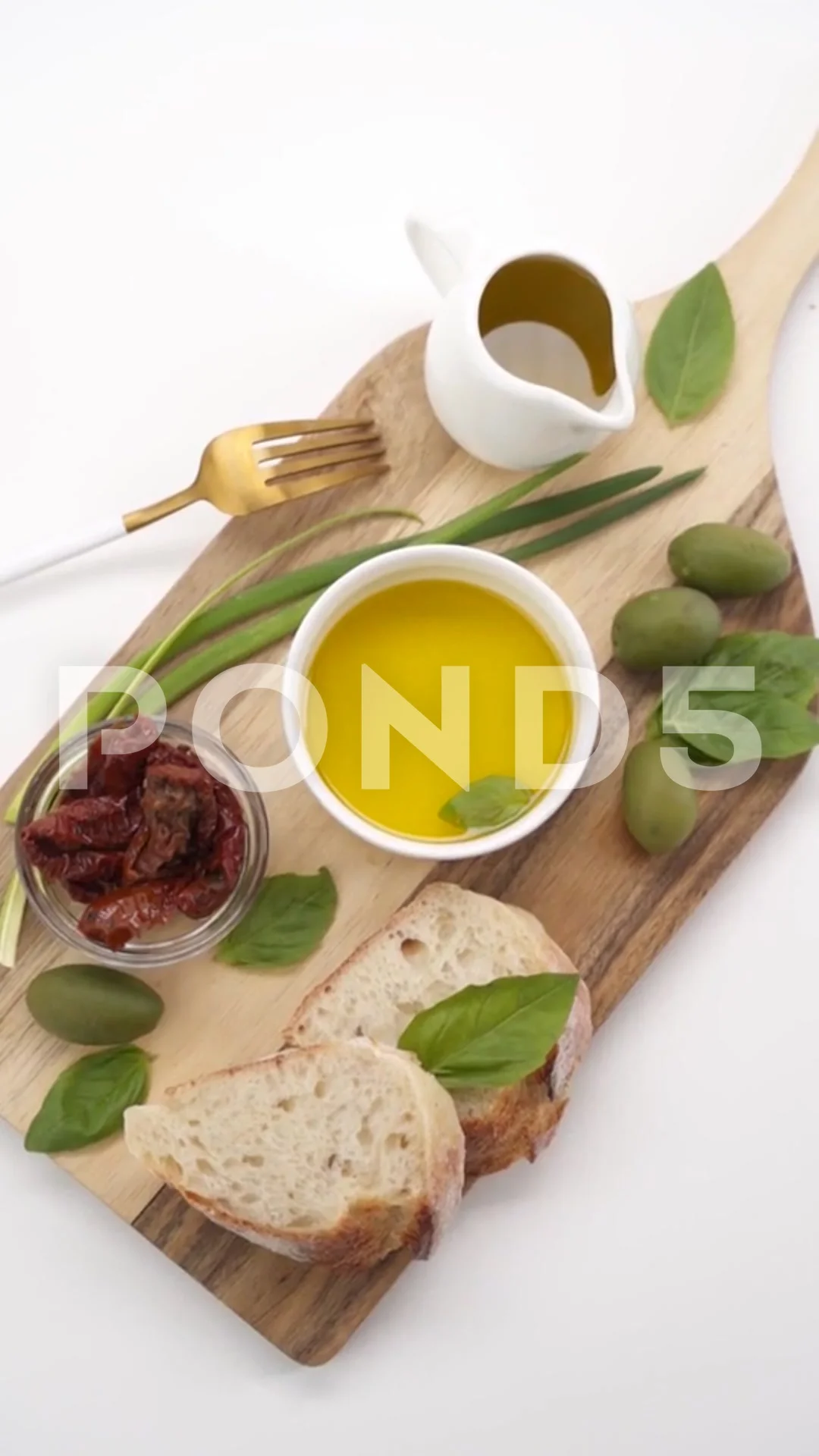 Vertical video: Olive oil with ingredients