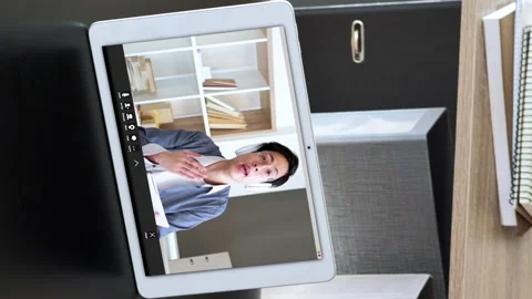Vertical video online learning man tablet home Stock Footage 255113754