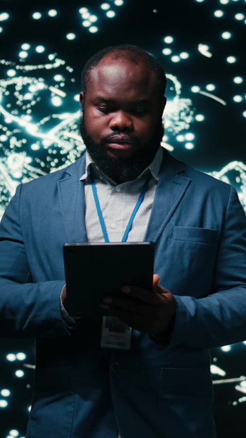 Vertical video Optimizing neural network, tablet and computer scientist using AR Stock Footage 330375596