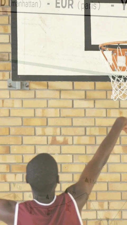 Vertical video: Orange ball falling through net, player shooting blue ball Stock Footage 330580844