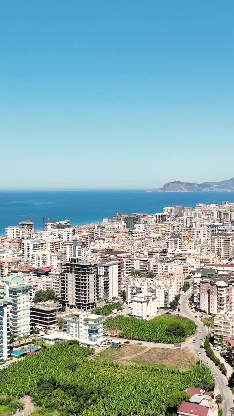Vertical Video: Overhead View of a Large Construction Site with Workers and Stock Footage 297725413