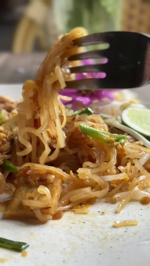 Vertical video of Pad Thai being eaten. Stock Footage 268795186