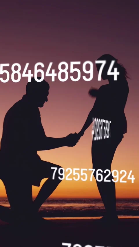Vertical video: Pair on beach touching urging man kneeling proposing IT data Stock Footage 333673443