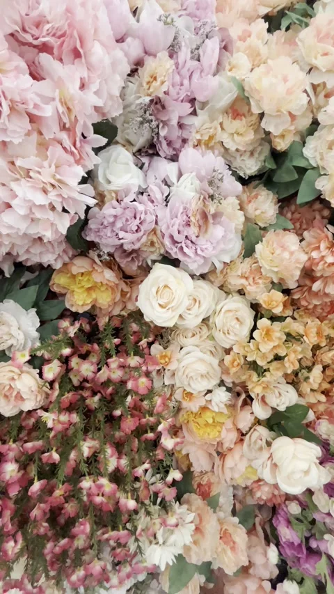Vertical video pan on artificial flowers. Exclusive Stock Footage 234217892