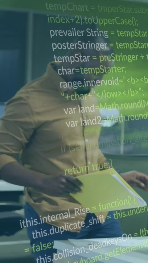 Vertical video: Pan code rising over yellow folder as man flipping pages in tech Stock Footage 330242423