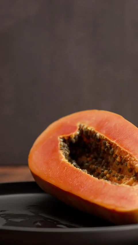 Vertical video Papaya Fruit, half a papaya Stock Footage 328896613