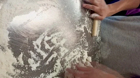 Vertical video of pastry dumpling preparation on a traditional way Stock Footage 265147522