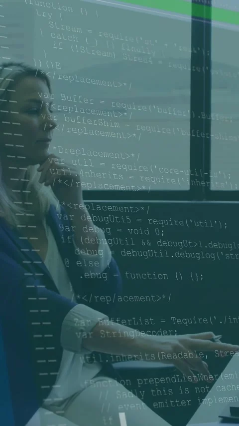 Vertical video: Pausing then typing woman in blue blazer in office, laptop code Stock Footage 333020535