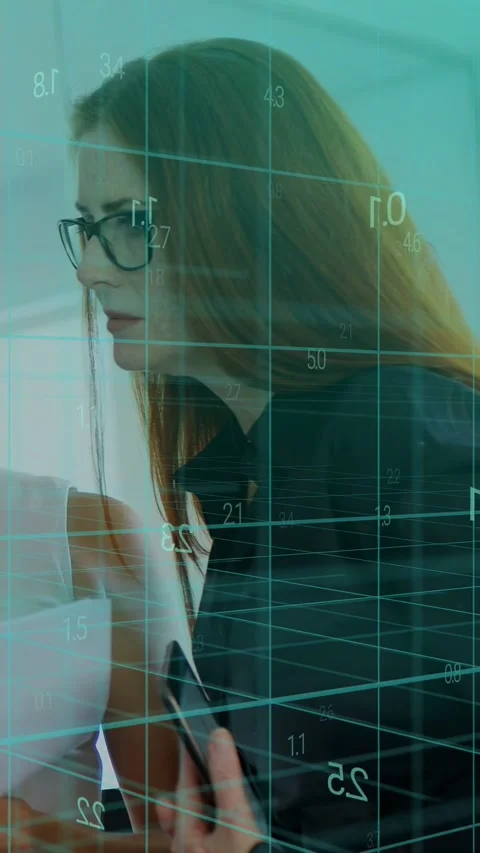 Vertical video: Peer giving docs urging specs woman leaning in reviewing, teal Stock Footage 334771069
