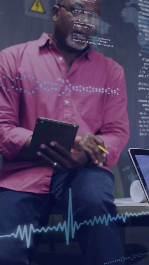 Vertical video: Peer moving laptop architect pointing explaining as data Stock Footage 333020956