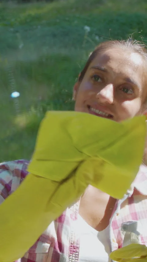 Vertical Video people, housework and housekeeping concept - woman in gloves Stock Footage 337992730