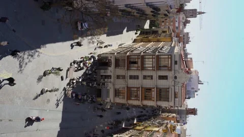 Vertical video of people walking through the plaza de los fueros in Valencia Stock Footage 194255494