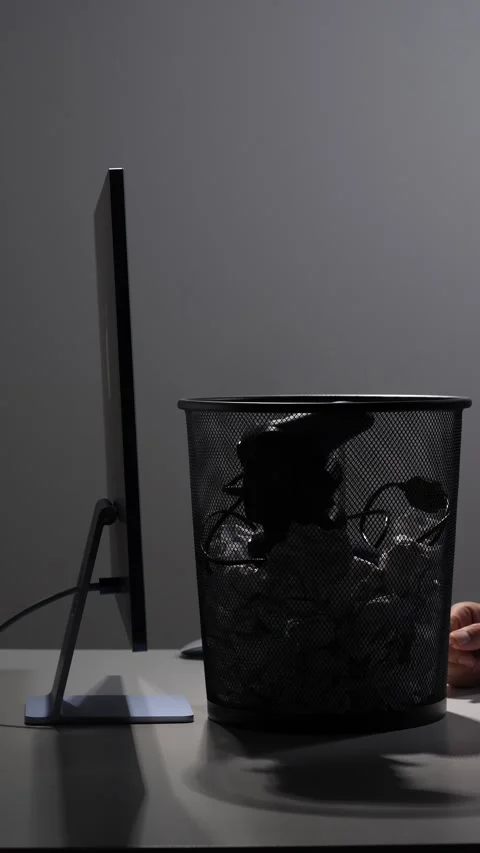 Vertical video person breaking a gaming habit by disposing of their controller Stock Footage 342672625