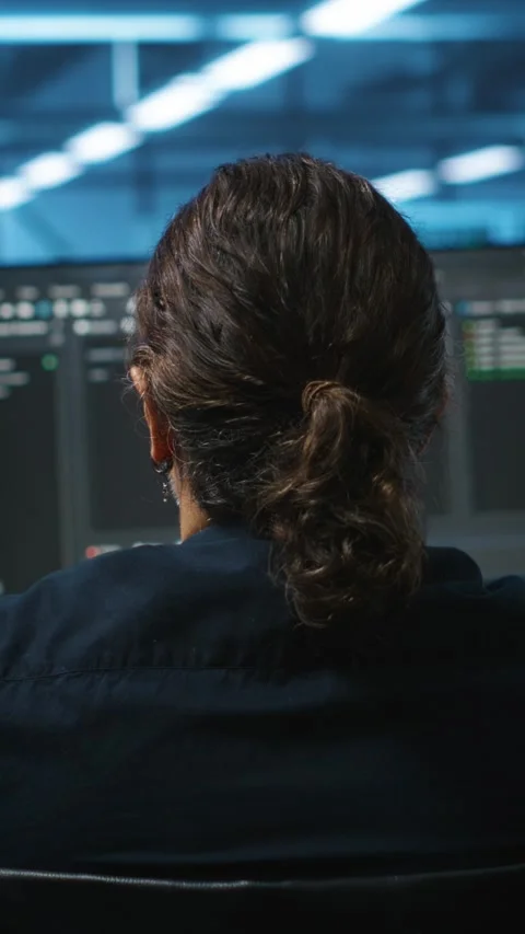 Vertical video Person with disability in inclusive server hub workspace working Stock Footage 276138099