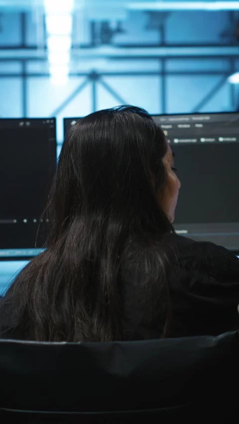Vertical video Person with paraplegia in server hub workplace doing inspection Stock Footage 276138783