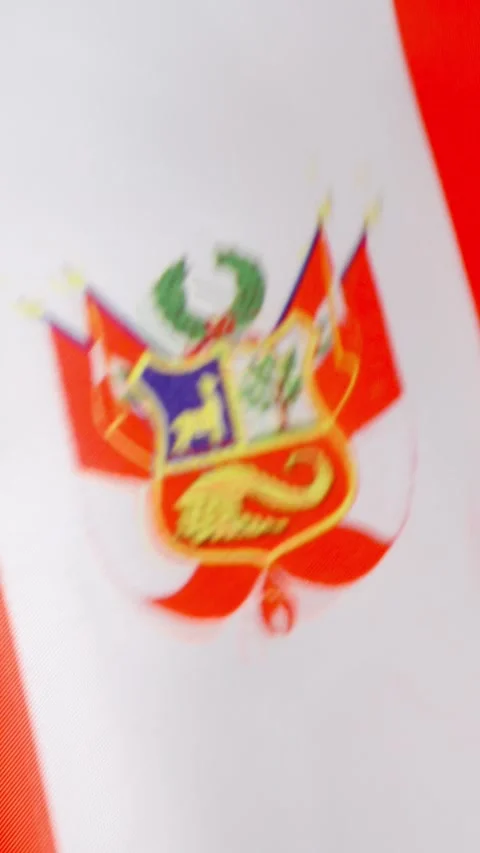 Vertical video of peruvian national flag waving by the wind Stock Footage 255930848