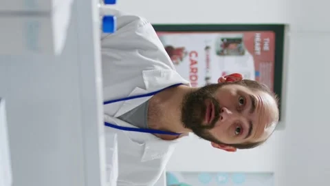 Vertical Video Pharmacist doing inventory using hologram projection Stock Footage 264790098