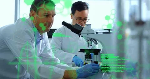 Vertical video: Placing slide 2 techs in coats gloves testing sample under scope 写真素材