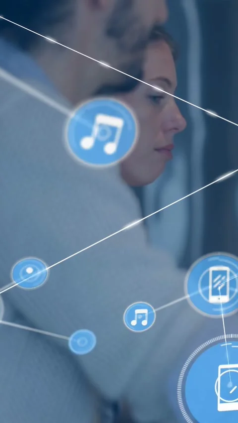 Vertical video: On plane couple reacting, tech icons appearing by window, Video stock 333236556