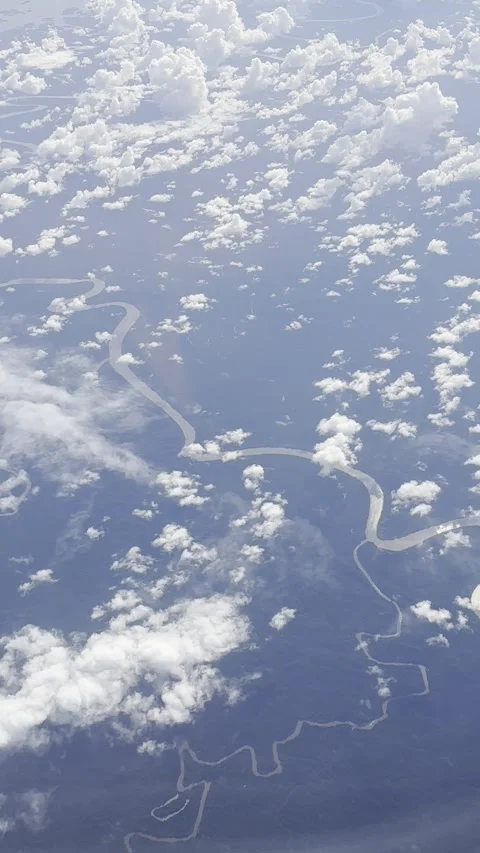 Vertical video from the plane window, beautiful clouds Stock Footage 255225413