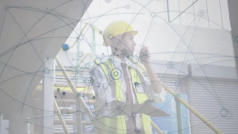 Vertical video: Plant supervisor using radio on stair starting node web around Stock Footage 332731708
