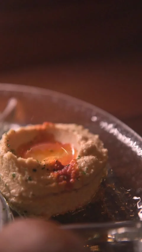 Vertical video of the plate of hummus. Arabic food Stock Footage 217575925
