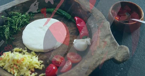 Vertical video: On play, board holding disk, chilis, overlays revealing key Stock Footage 330960216