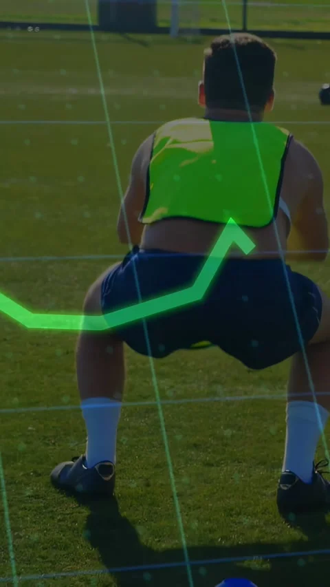 Vertical video: Player on cue, doing shuffles, hops and squats for sports, neon Stock Footage 329913475