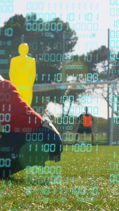 Vertical video: Player kicking ball for soccer drill, code overlay tracking path Stock Footage 333487346