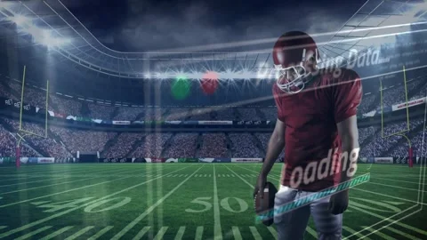 Vertical video: Player standing 50-yard line while loading bar appearing over Stock Footage 330621974