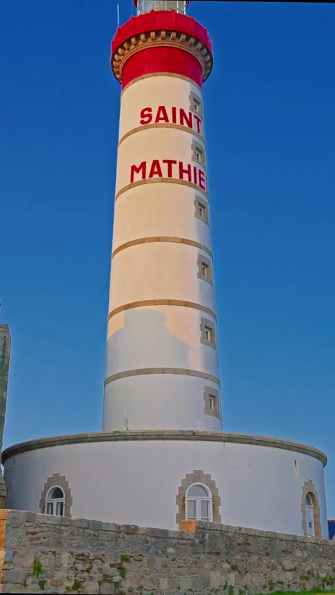 Vertical video. Pointe Saint Mathieu lighthouse, Finistere, Brittany, France Stock Footage 303661510