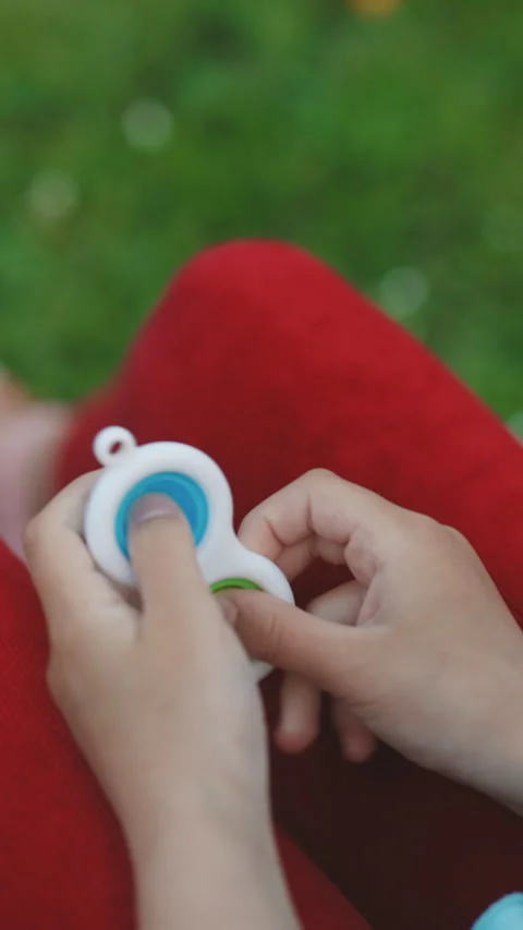 Vertical Video of Pop it simple dimple popit anti-stress sensory toy for Stock Footage 305030591