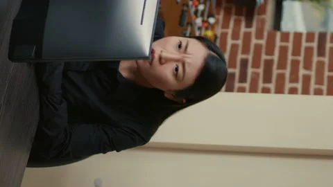 Vertical video Portrait of asian programer focused on writing code encounters Stock Footage 194146256