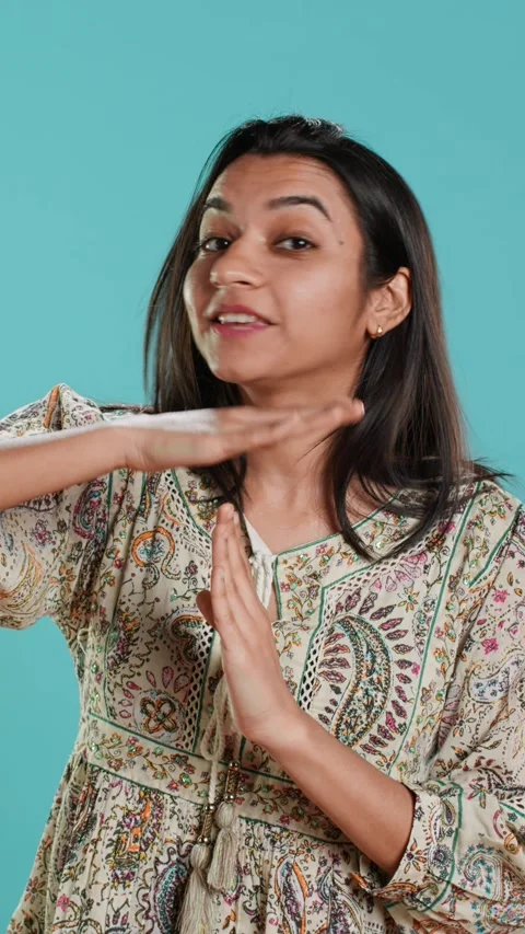 Vertical video Portrait of assertive woman asking for timeout, doing hand Stock Footage 275205979