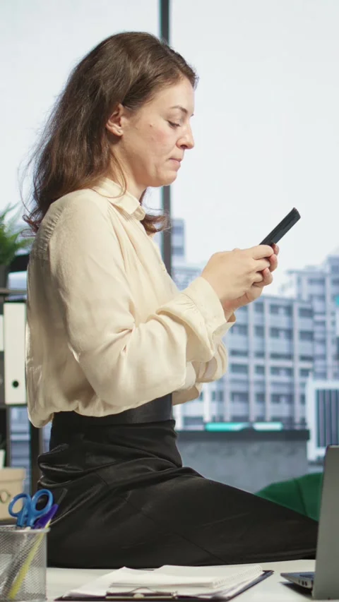 Vertical Video Portrait of goal oriented powerful CEO sitting on office posing Stock Footage 283305993