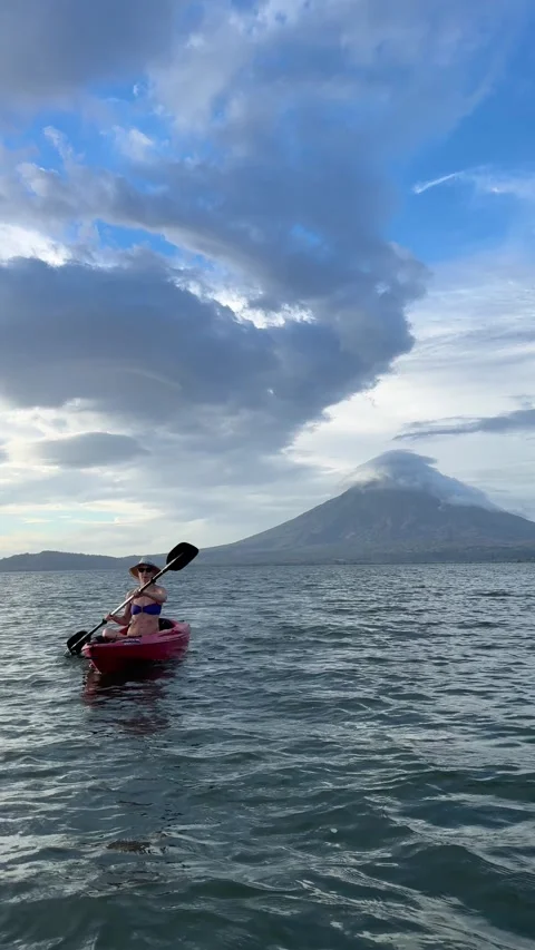 Vertical Video Portrait of Kayaking at Sunset Near Concepcion Volcano on Ometepe Stock Footage 303828018