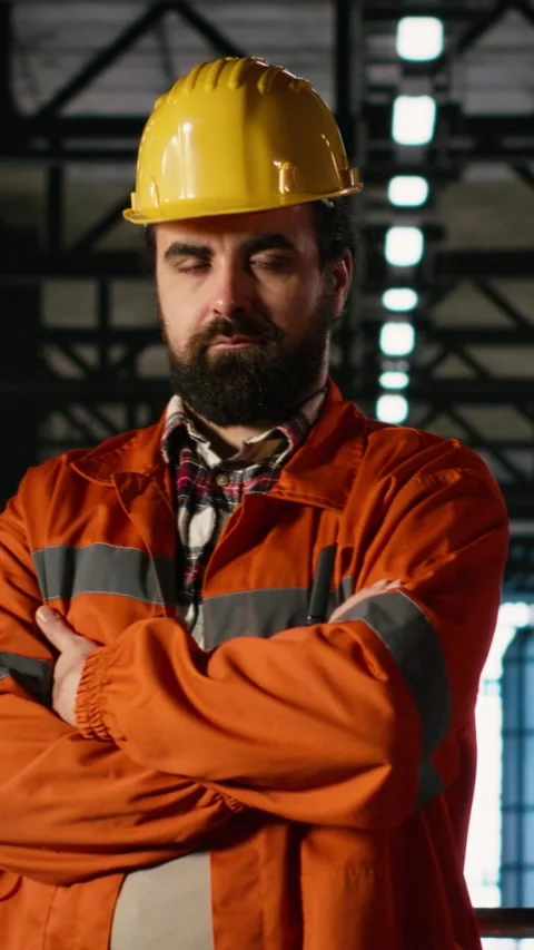 Vertical Video Portrait man, engineer verifying steel work and welding in Video stock 330439322