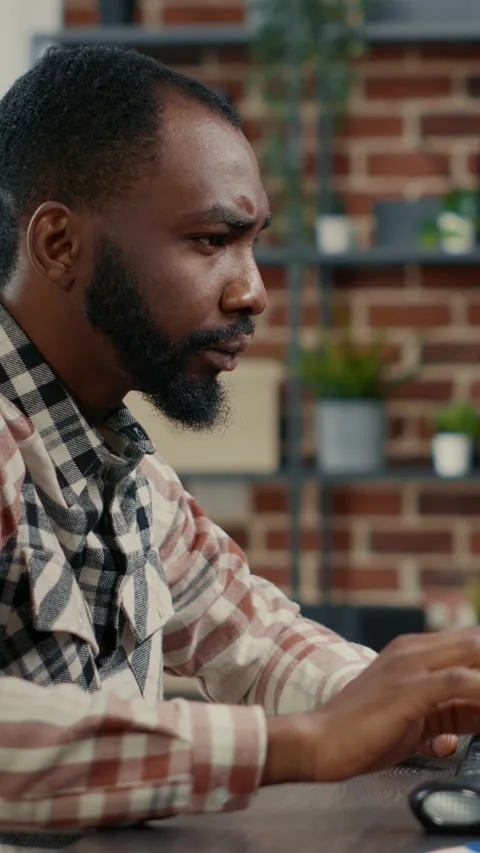 Vertical video Portrait of programer typing programming code on computer Stock Footage 201721180